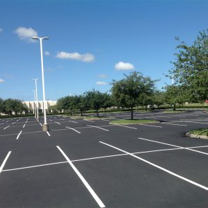Comparison of grey oxidized asphalt versus fresh black sealcoating in Florida Comparison of grey oxidized asphalt versus fresh black sealcoating in Florida